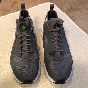 Gray and white Nike Air Huarache